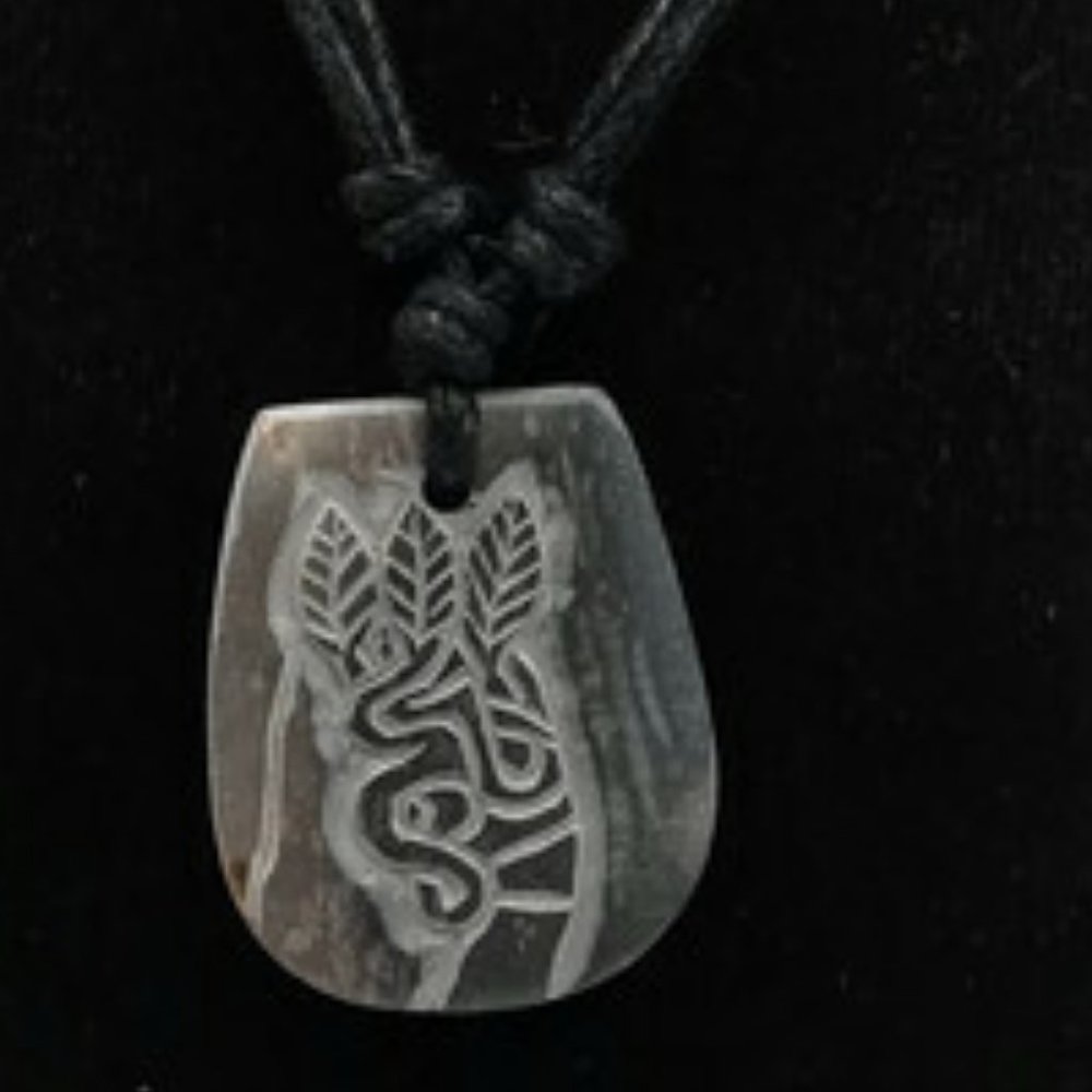 Hand Carved Jaguar Necklace with Kintu Leaf Detail
